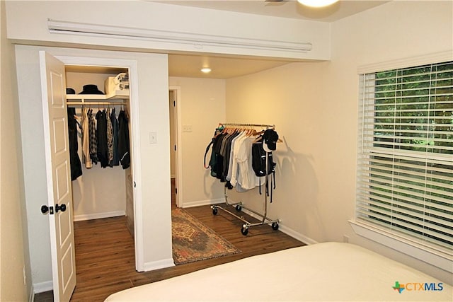 921 N 10th St, Temple, TX 76501 - bedroom featuring wood finished floors and a closet