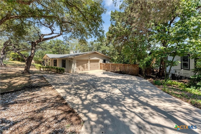 view of front of property featuring a garage