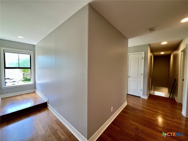 26 Cotswold Ln, Victoria, TX 77904 - hallway with an upstairs landing, wood finished floors, and recessed lighting