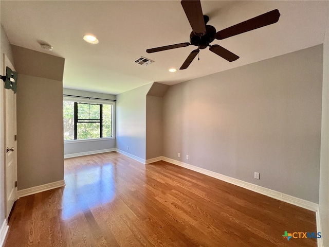 26 Cotswold Ln, Victoria, TX 77904 - empty room with recessed lighting, wood finished floors, a ceiling fan, and a smoke detector