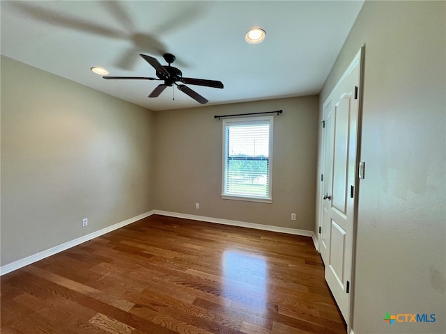 26 Cotswold Ln, Victoria, TX 77904 - unfurnished bedroom with dark wood-style floors, recessed lighting, and ceiling fan
