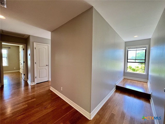 26 Cotswold Ln, Victoria, TX 77904 - hall with dark wood-style floors, plenty of natural light, and recessed lighting