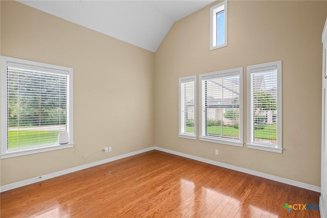 26 Cotswold Ln, Victoria, TX 77904 - spare room featuring light wood-type flooring and lofted ceiling