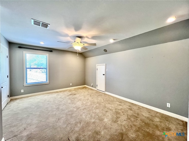 26 Cotswold Ln, Victoria, TX 77904 - spare room featuring a ceiling fan, carpet flooring, and lofted ceiling