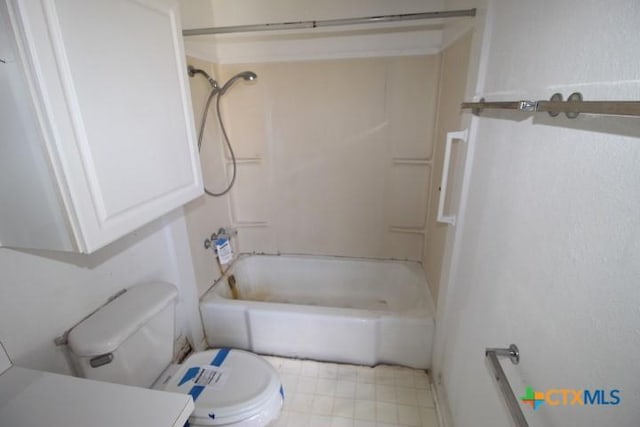 bathroom featuring shower / bathing tub combination and toilet