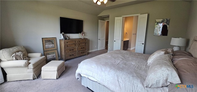 633 Vale Ct, New Braunfels, TX 78132 - carpeted bedroom with lofted ceiling, connected bathroom, and baseboards