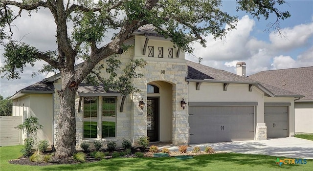 633 Vale Ct, New Braunfels, TX 78132 - view of front of property featuring stone siding, a garage, stucco siding, concrete driveway, and a shingled roof