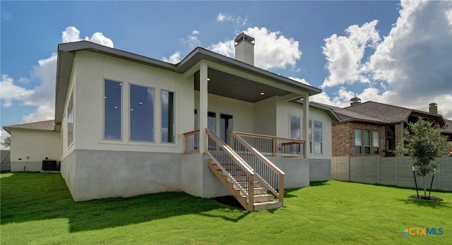 633 Vale Ct, New Braunfels, TX 78132 - rear view of house with central AC, stucco siding, stairway, a chimney, and a wooden deck