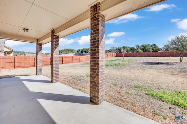 view of patio featuring a fenced backyard