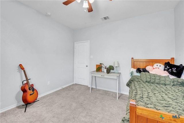 bedroom featuring visible vents, light carpet, baseboards, and a ceiling fan