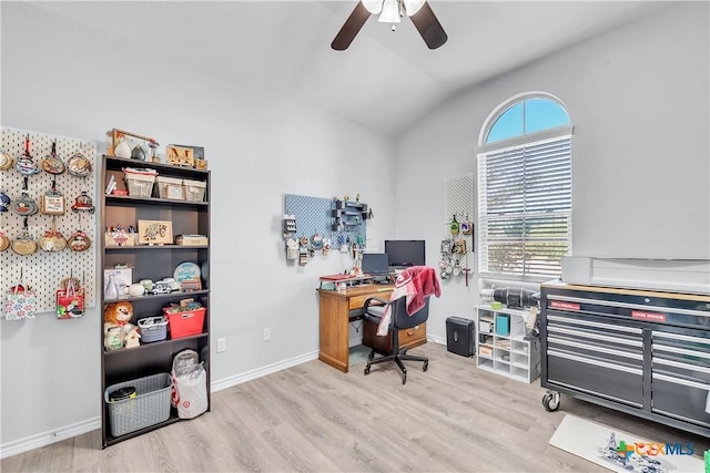 office featuring vaulted ceiling, wood finished floors, baseboards, and ceiling fan