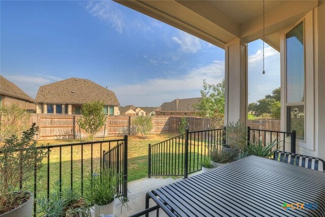 balcony featuring a residential view