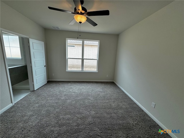 unfurnished bedroom with carpet floors and ceiling fan