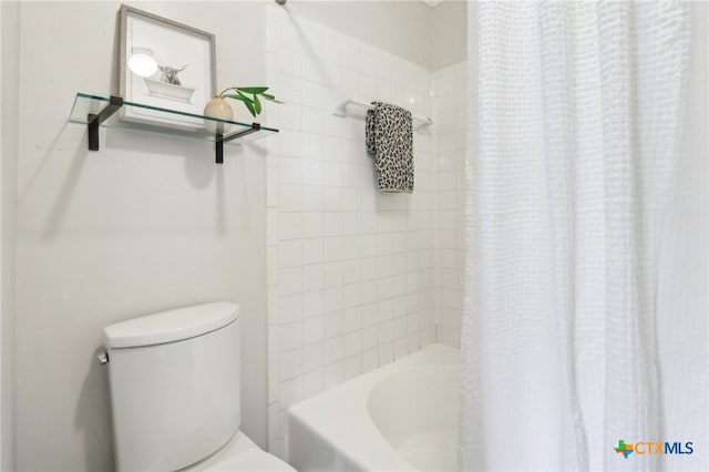 full bath featuring toilet and shower / bath combination with curtain