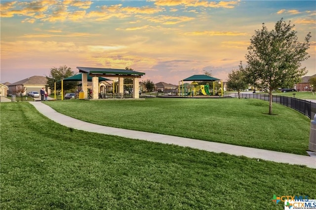 view of home's community with a gazebo and a lawn