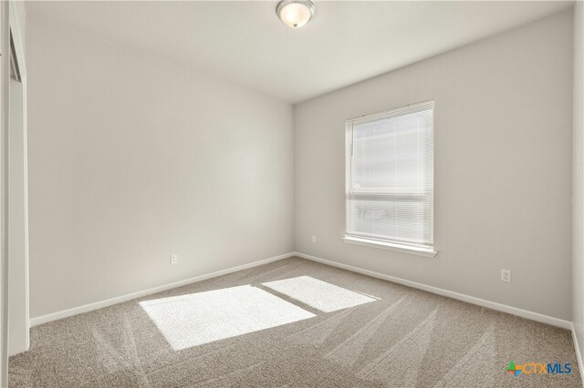 6109 Worthing Dr, Temple, TX 76502 - spare room featuring carpet flooring and baseboards