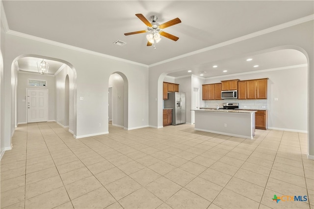 unfurnished living room with light tile patterned floors, ceiling fan with notable chandelier, and ornamental molding