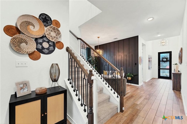 1620 Craftsman, New Braunfels, TX 78132 - stairway with a chandelier, wood finished floors, and recessed lighting