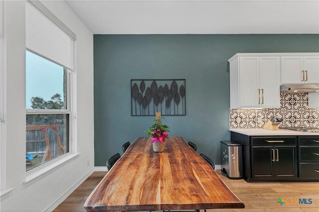1620 Craftsman, New Braunfels, TX 78132 - dining area featuring light wood-type flooring and baseboards