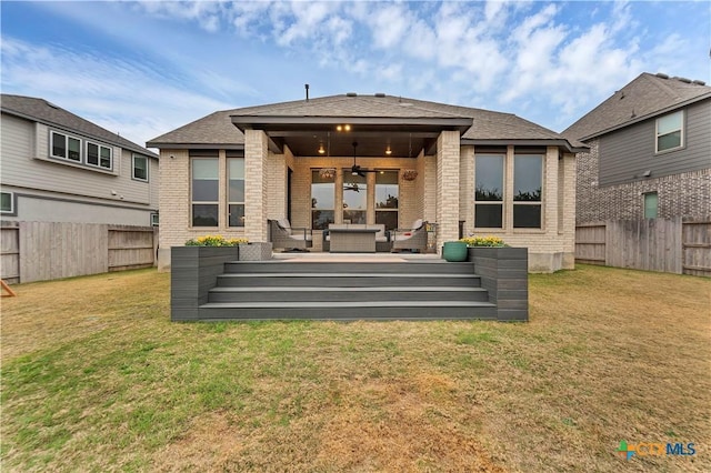 1620 Craftsman, New Braunfels, TX 78132 - rear view of property featuring brick siding, a ceiling fan, a fenced backyard, and a deck