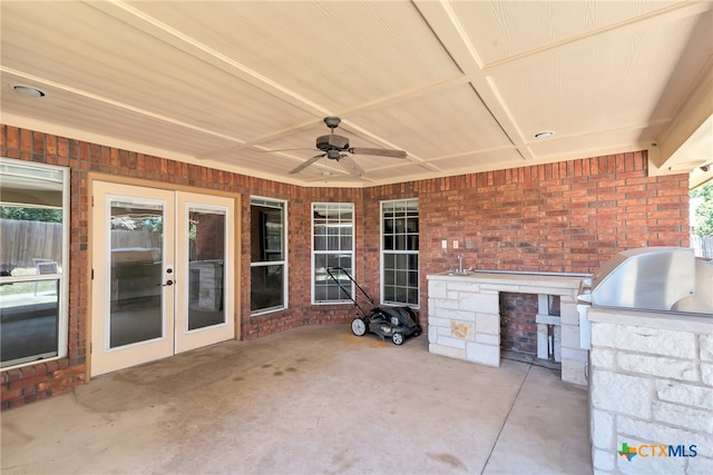 view of patio / terrace featuring area for grilling and ceiling fan