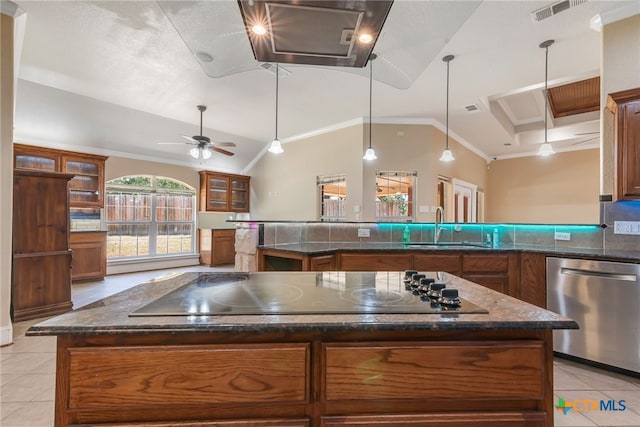 kitchen featuring sink, dishwasher, a center island, and black electric stovetop