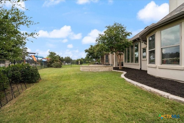 view of yard with fence