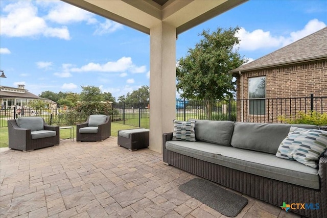 view of patio featuring a fenced backyard and an outdoor hangout area
