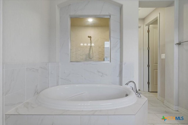bathroom with a bath