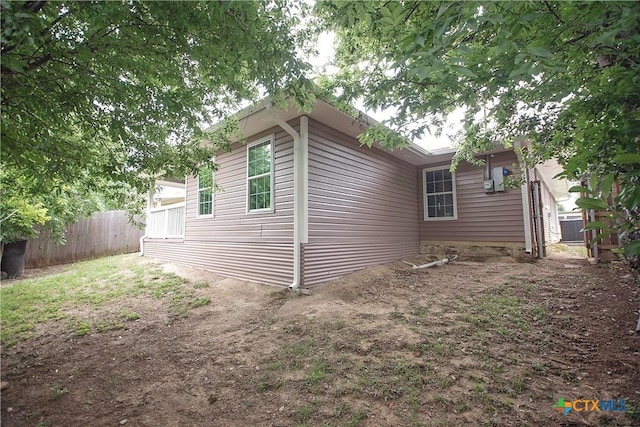 1317 N 10th St, Temple, TX 76501 - view of side of home with fence