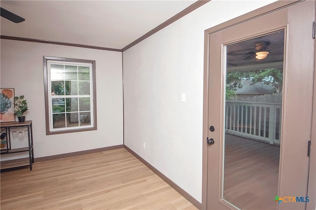 1317 N 10th St, Temple, TX 76501 - unfurnished room with ceiling fan, light wood-type flooring, ornamental molding, and baseboards