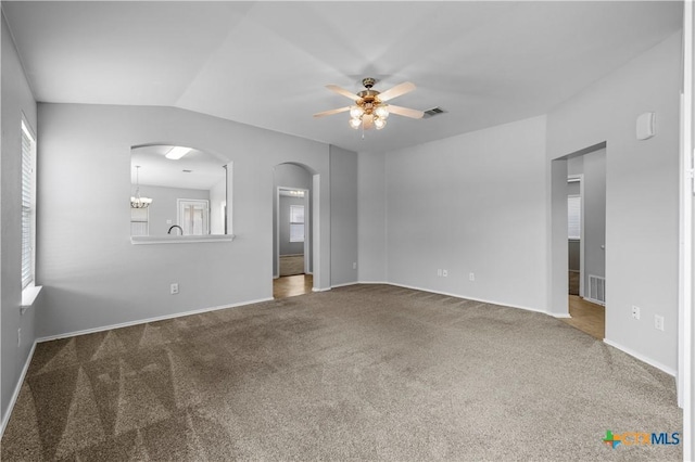 329 Big Timber Dr, Temple, TX 76502 - unfurnished room featuring healthy amount of natural light, ceiling fan, carpet, and arched walkways