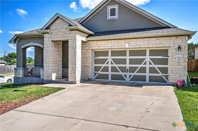 9006 Single Bend Trl, Temple, TX 76502 - french country home with stone siding, driveway, a garage, stucco siding, and a shingled roof