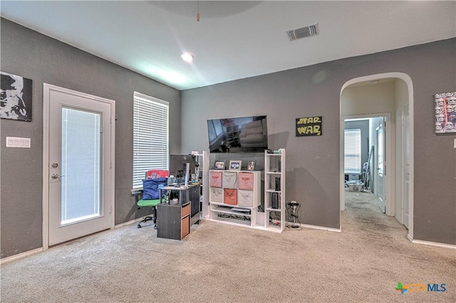 9006 Single Bend Trl, Temple, TX 76502 - carpeted home office with arched walkways and plenty of natural light