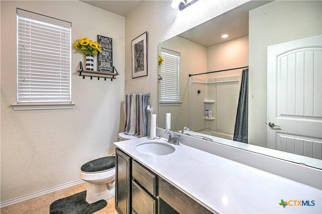 9006 Single Bend Trl, Temple, TX 76502 - bathroom with vanity, a shower with curtain, a textured wall, and tile patterned floors