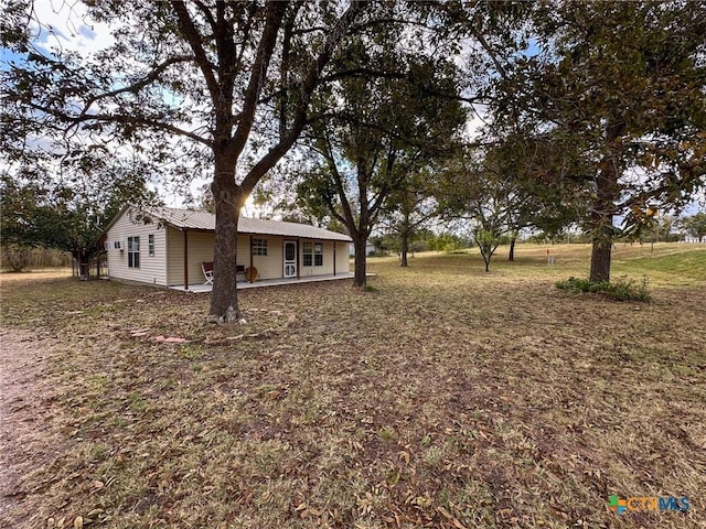 view of yard with a patio area