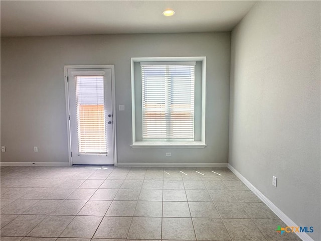 137 Rustic Glen Dr, San Marcos, TX 78666 - doorway to outside with light tile patterned flooring, baseboards, and recessed lighting