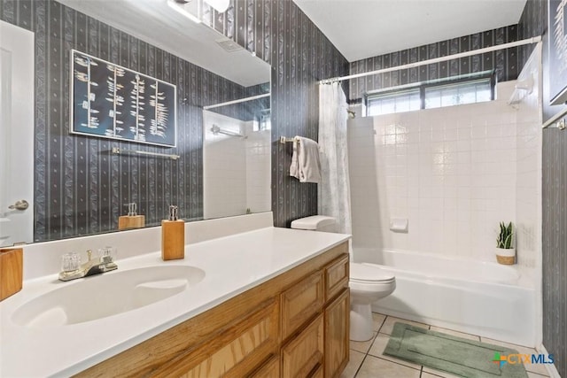 4402 Frontier Trl, Killeen, TX 76542 - bathroom with toilet, wallpapered walls, shower / bath combo with shower curtain, tile patterned flooring, and vanity