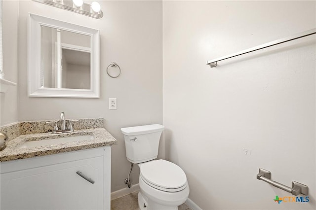 1008 Ronstan Dr, Killeen, TX 76542 - half bathroom with vanity, toilet, baseboards, and tile patterned flooring