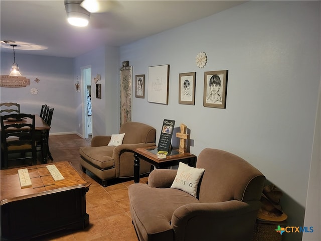 living room with ceiling fan