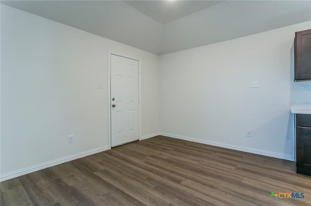3820 Poteet Ct, Temple, TX 76504 - empty room featuring baseboards and dark wood-type flooring