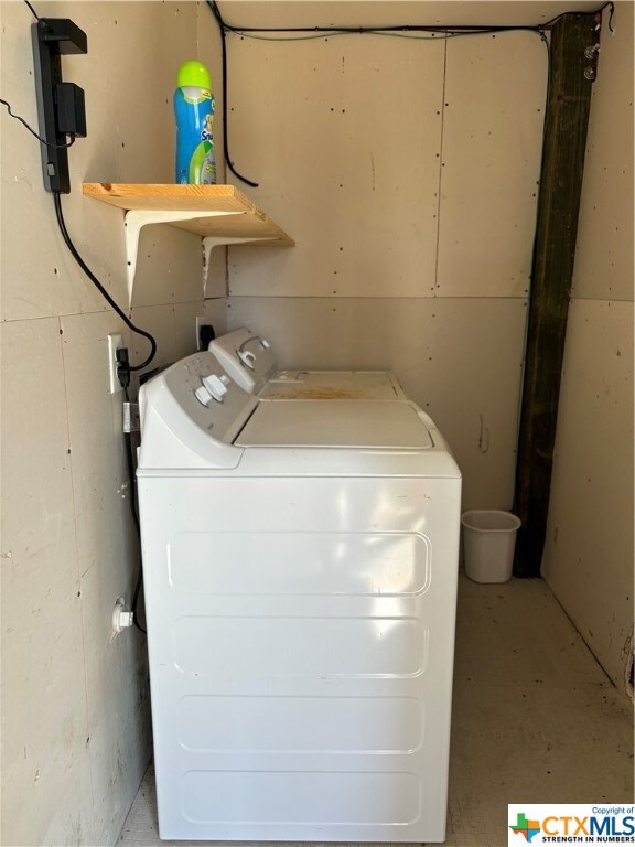 laundry area featuring independent washer and dryer