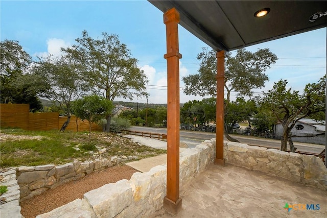 view of patio / terrace with fence