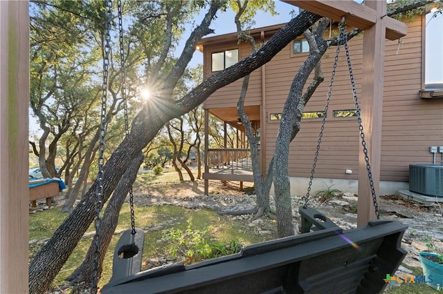 1560 Roadrunner Ln, Canyon Lake, TX 78133 - view of side of property featuring a central air condition unit