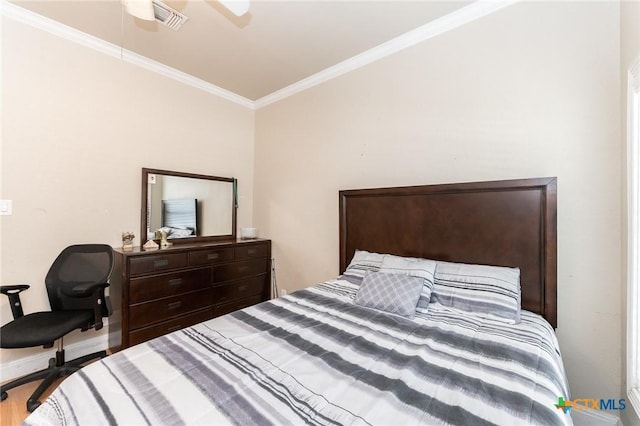 235 Gray St, San Antonio, TX 78208 - bedroom with crown molding, wood finished floors, a ceiling fan, and baseboards