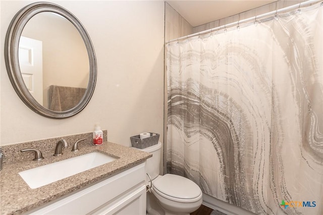 235 Gray St, San Antonio, TX 78208 - full bath with vanity, toilet, and a shower with curtain