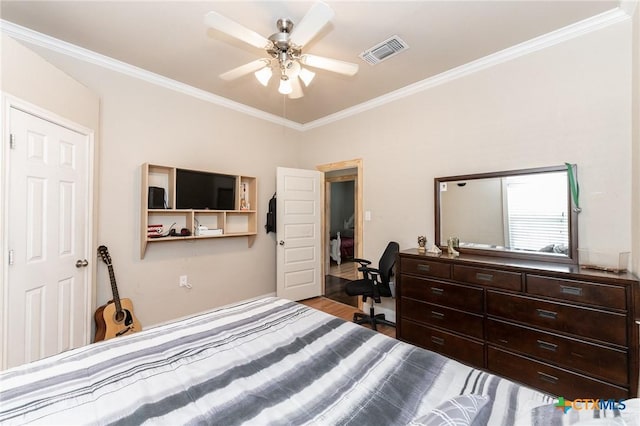 235 Gray St, San Antonio, TX 78208 - bedroom featuring crown molding, wood finished floors, a desk, and a ceiling fan