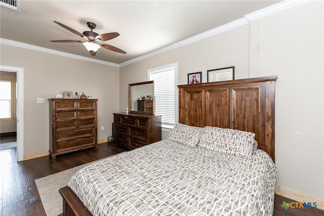 235 Gray St, San Antonio, TX 78208 - bedroom featuring baseboards, dark wood-style floors, ornamental molding, and ceiling fan