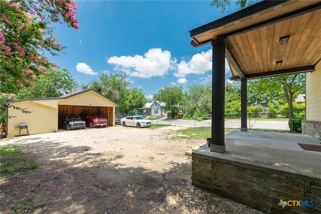 235 Gray St, San Antonio, TX 78208 - view of yard featuring a carport