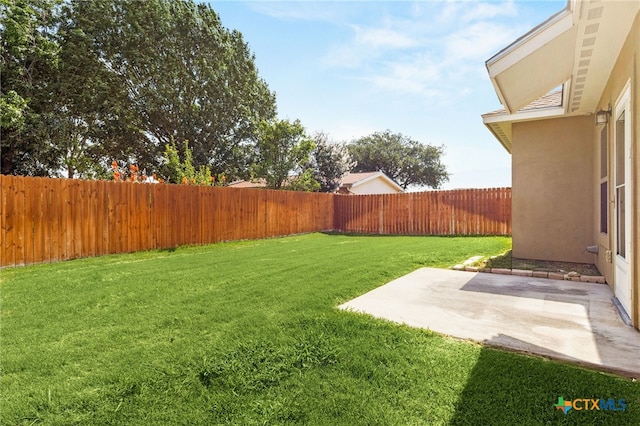 152 Navarro Xing Unit 3B, Seguin, TX 78155 - fenced backyard featuring a patio